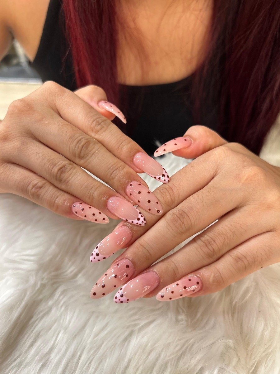 Nude stiletto nails with fine dot art