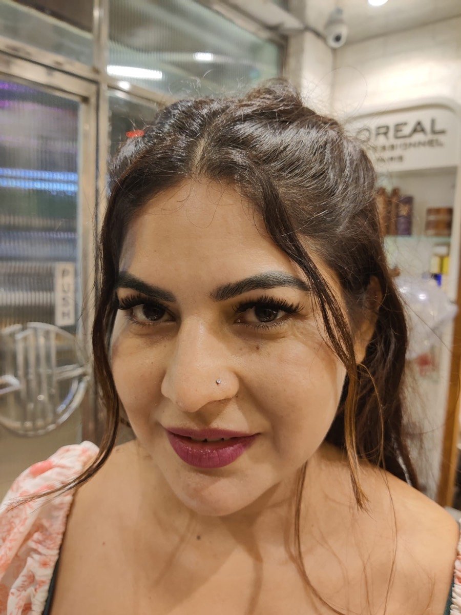 Client with volume eyelash extensions, front view